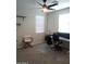 Home office with desk and chair at 3094 N 195Th Dr, Buckeye, AZ 85396