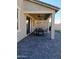 Covered patio with seating area and ceiling fans at 3094 N 195Th Dr, Buckeye, AZ 85396