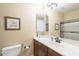 Bathroom with single sink vanity and shower/tub combo at 3151 E Turnberry Dr, Gilbert, AZ 85298