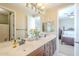 Double vanity bathroom with a view of a bedroom at 3151 E Turnberry Dr, Gilbert, AZ 85298