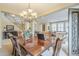 Formal dining room with a chandelier and wooden table at 3151 E Turnberry Dr, Gilbert, AZ 85298