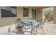 Small patio with metal table and chairs, ideal for outdoor dining at 3151 E Turnberry Dr, Gilbert, AZ 85298