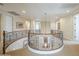 Spacious upper hallway with curved railing overlooking the entryway at 3151 E Turnberry Dr, Gilbert, AZ 85298