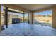 Spacious covered patio with a water feature and built-in seating at 316 E Leverenz Ave, Queen Creek, AZ 85140