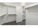 Spacious walk-in closet with custom shelving and hanging space at 316 E Leverenz Ave, Queen Creek, AZ 85140