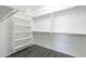 Large walk-in closet with ample shelving and hanging space at 316 E Leverenz Ave, Queen Creek, AZ 85140