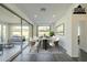 Bright dining room with sliding glass doors leading to the backyard at 316 E Leverenz Ave, Queen Creek, AZ 85140