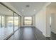 Bright dining room with sliding glass doors leading to the backyard at 316 E Leverenz Ave, Queen Creek, AZ 85140