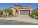 Beautiful brick home with a two-car garage at 316 E Leverenz Ave, Queen Creek, AZ 85140