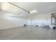 Bright and spacious garage with extra storage at 316 E Leverenz Ave, Queen Creek, AZ 85140