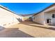 Backyard with shade sail and block wall at 31828 N Ash St, Wittmann, AZ 85361