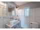 Charming bathroom with white subway tiles, a vessel sink, and a rustic vanity at 32633 N 137Th St, Scottsdale, AZ 85262