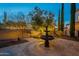 Tranquil courtyard with fountain and string lights at 32633 N 137Th St, Scottsdale, AZ 85262