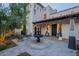 Charming courtyard entry with fountain and string lights at 32633 N 137Th St, Scottsdale, AZ 85262