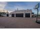 Three-car garage with paver driveway at 32633 N 137Th St, Scottsdale, AZ 85262