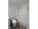 Clean bathroom with bathtub and wood-look floors at 3408 W Mclellan Blvd, Phoenix, AZ 85017