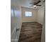 Bright bedroom with ceiling fan and wood-look floors at 3408 W Mclellan Blvd, Phoenix, AZ 85017