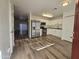 Bright kitchen with stainless steel appliances and wood-look flooring at 3408 W Mclellan Blvd, Phoenix, AZ 85017