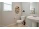 Stylishly updated half bathroom with pedestal sink at 3419 W Dreamy Draw Dr, San Tan Valley, AZ 85144