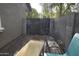 Small backyard with gate and seating area at 3432 E Bartlett Dr, Gilbert, AZ 85234