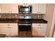 Stainless steel appliances in this modern kitchen at 3432 E Bartlett Dr, Gilbert, AZ 85234