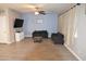 Cozy living room with two sofas, a coffee table, and a blue accent wall at 3432 E Bartlett Dr, Gilbert, AZ 85234