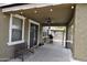 Covered patio with ceiling fan and string lights at 3432 E Bartlett Dr, Gilbert, AZ 85234