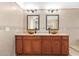 Bathroom with double vanity and large mirrors at 3947 N Carnation Ln, Avondale, AZ 85392