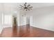 Bright bedroom with hardwood floors and ensuite bathroom access at 3947 N Carnation Ln, Avondale, AZ 85392