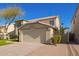 Two-story house with a large front yard and attached garage at 3947 N Carnation Ln, Avondale, AZ 85392