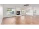 Living room with tile floors, fireplace, and ceiling fan at 3947 N Carnation Ln, Avondale, AZ 85392