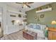 Cozy living room with white couch and green walls at 4102 E Ray Rd # 1006, Phoenix, AZ 85044