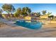 Inviting community pool with ample lounge chairs at 4102 E Ray Rd # 1006, Phoenix, AZ 85044