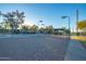 Sand volleyball court with surrounding park amenities at 4102 E Ray Rd # 1006, Phoenix, AZ 85044