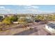 Aerial view of house and detached garage with solar panels at 4205 E Peak View Rd, Cave Creek, AZ 85331