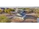 Aerial view of house with solar-powered detached garage at 4205 E Peak View Rd, Cave Creek, AZ 85331