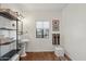 Modern bathroom with pedestal sink, concrete floor, and stylish shelving at 4205 E Peak View Rd, Cave Creek, AZ 85331