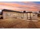 Home's back exterior with covered patio and ramp at 4205 E Peak View Rd, Cave Creek, AZ 85331