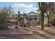 Charming ranch house with covered porch and saguaro cactus at 4205 E Peak View Rd, Cave Creek, AZ 85331