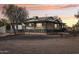 Stunning ranch house exterior with a large covered porch at 4205 E Peak View Rd, Cave Creek, AZ 85331