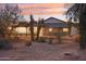 Home exterior showcasing the front yard and landscaping at 4205 E Peak View Rd, Cave Creek, AZ 85331