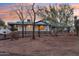 Ranch style home with a large covered patio and mature trees at 4205 E Peak View Rd, Cave Creek, AZ 85331