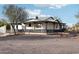 One story home with a long covered porch and walkway at 4205 E Peak View Rd, Cave Creek, AZ 85331