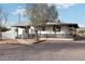 Charming one-story home with a spacious covered patio at 4205 E Peak View Rd, Cave Creek, AZ 85331