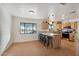 Modern kitchen with light wood cabinets, granite countertops, and stainless steel appliances at 4205 E Peak View Rd, Cave Creek, AZ 85331