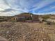 View of home's backyard, rocky landscape and desert plants at 46312 N 38Th Ave, New River, AZ 85087