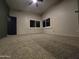 Spacious bedroom with carpet and large windows at 46312 N 38Th Ave, New River, AZ 85087