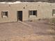 Side view of stucco home with walkway and desert landscaping at 46312 N 38Th Ave, New River, AZ 85087