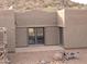 Back patio with double doors leading to the interior at 46312 N 38Th Ave, New River, AZ 85087