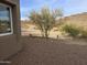 Gravel side yard with desert landscaping and mountain views at 46312 N 38Th Ave, New River, AZ 85087